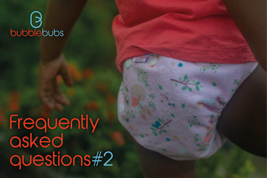 Toddler-walking-around-wearing-a-pink-modern-cloth-nappy-in-Australia