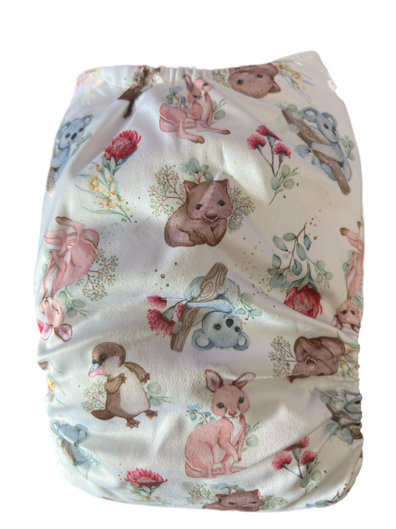Candie Anne cloth nappy. australian animals on a white background with flowers