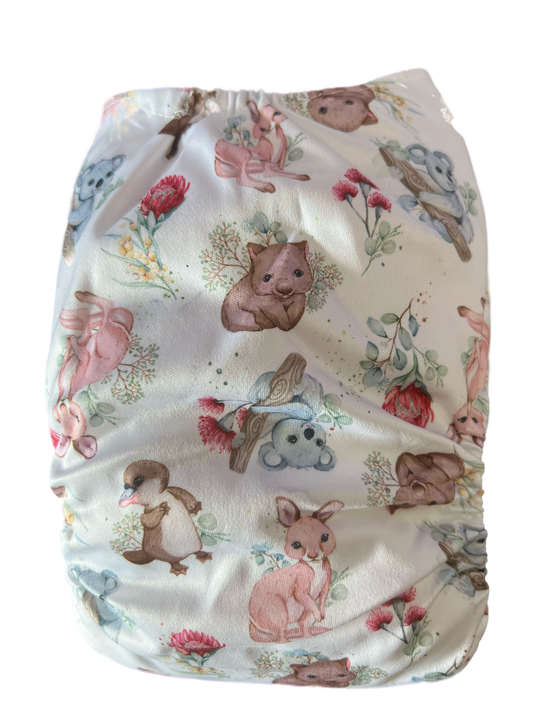 Candie Anne cloth nappy. australian animals on a white background with flowers
