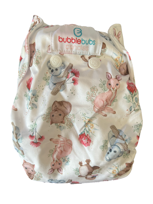 Candie Anne cloth nappy. australian animals on a white background with flowers back of cloth nappy