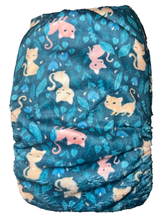 cats and flowers blue on a candie cloth nappy