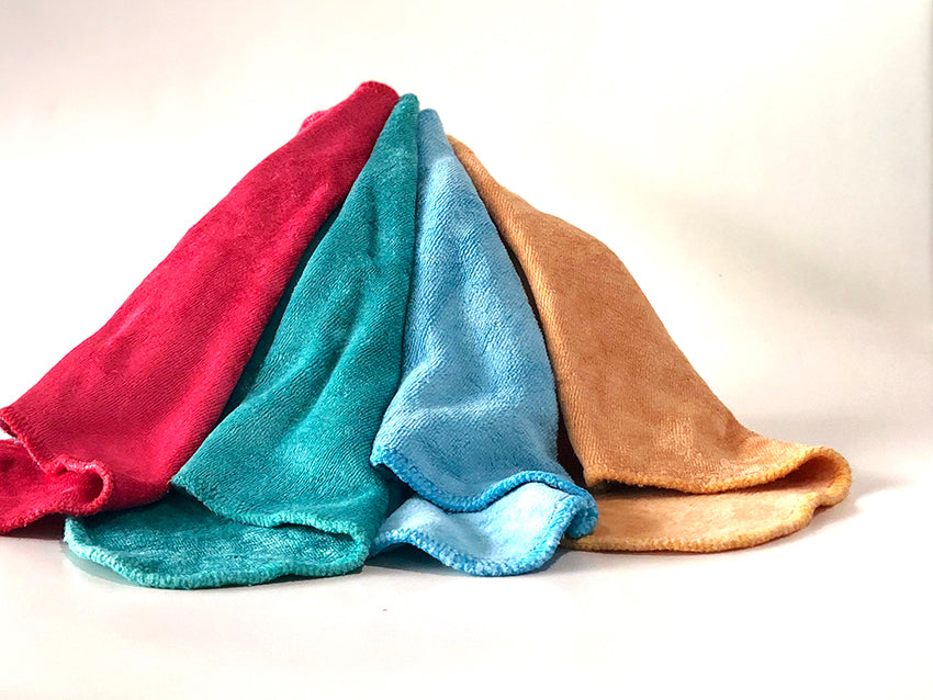 Reusable cloth wipes in a rainbow of colour made from luxuriously soft bamboo velour.