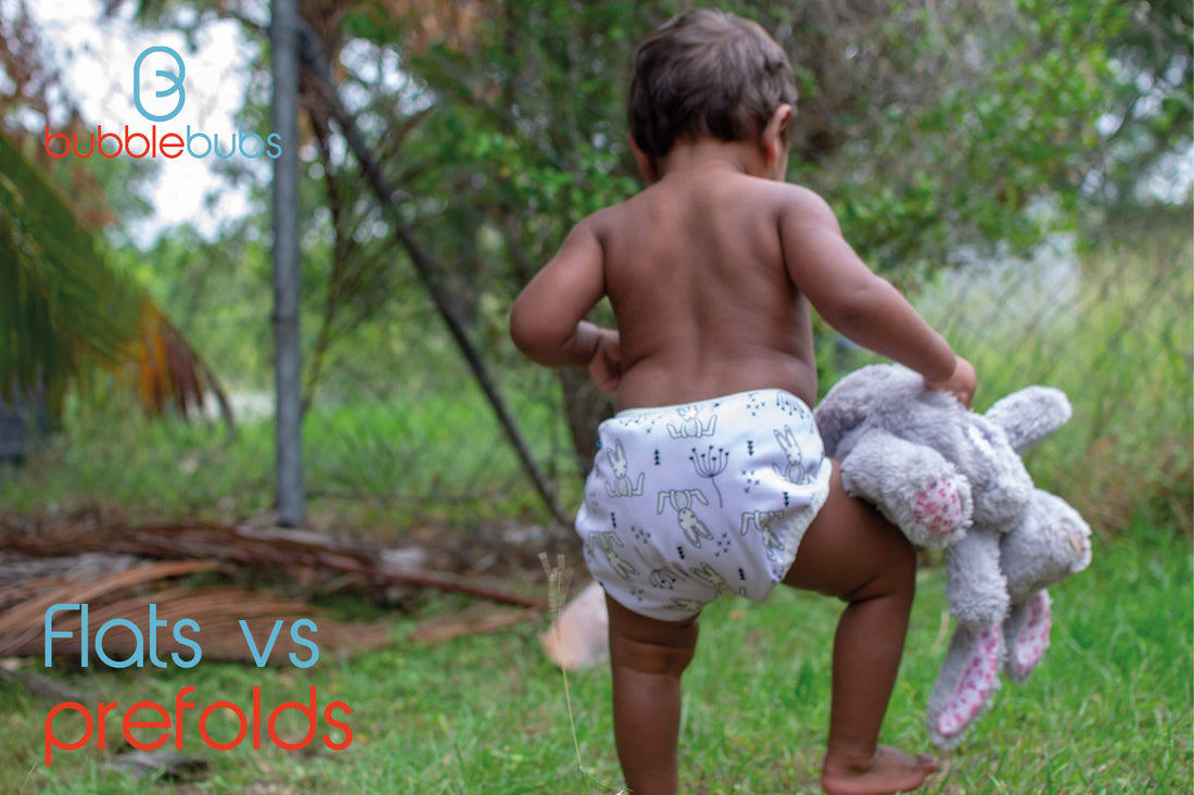 Indigenous-Australian-child-wearing-a-cloth-nappy-outside-in-a-backyard-with-lots-of-greenery