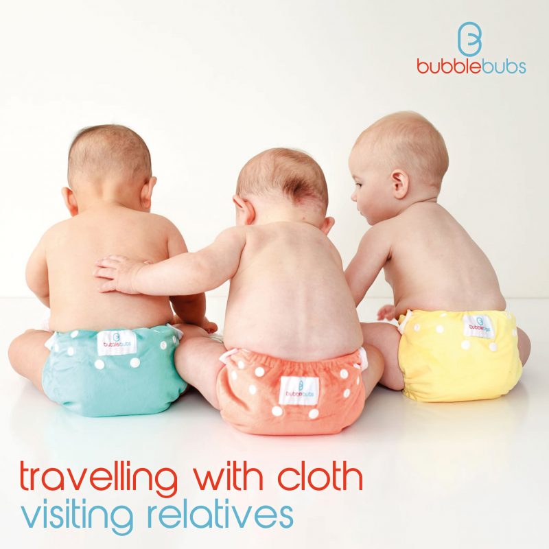 Three-babies-wearing-Australian-modern-cloth-nappies-in-various-colours
