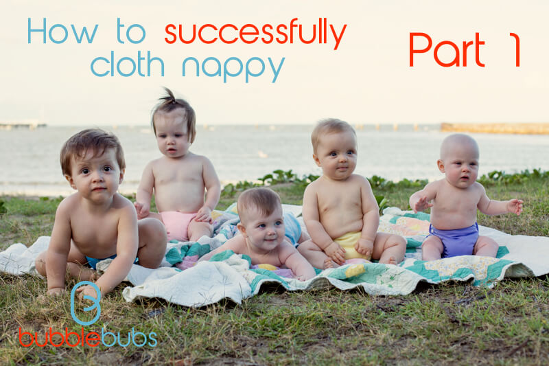 Five happy babies with cloth nappies