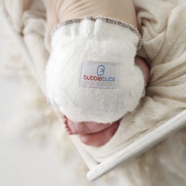 Close-up of a Bambam fitted cloth nappy on a baby's bottom