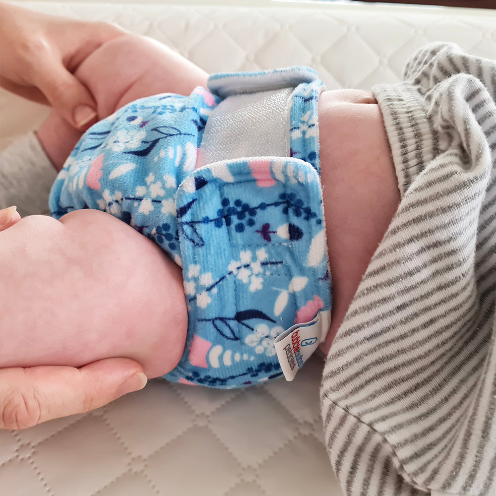 pebbles newborn cloth nappy blue on a newborn baby