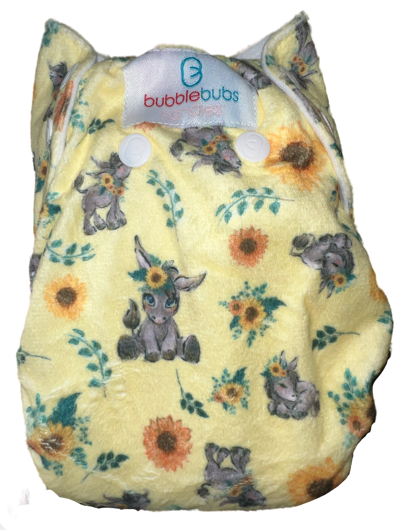 Candie cloth nappy donkey pattern. yellow backfround with donkey and flowers Bubblebubs